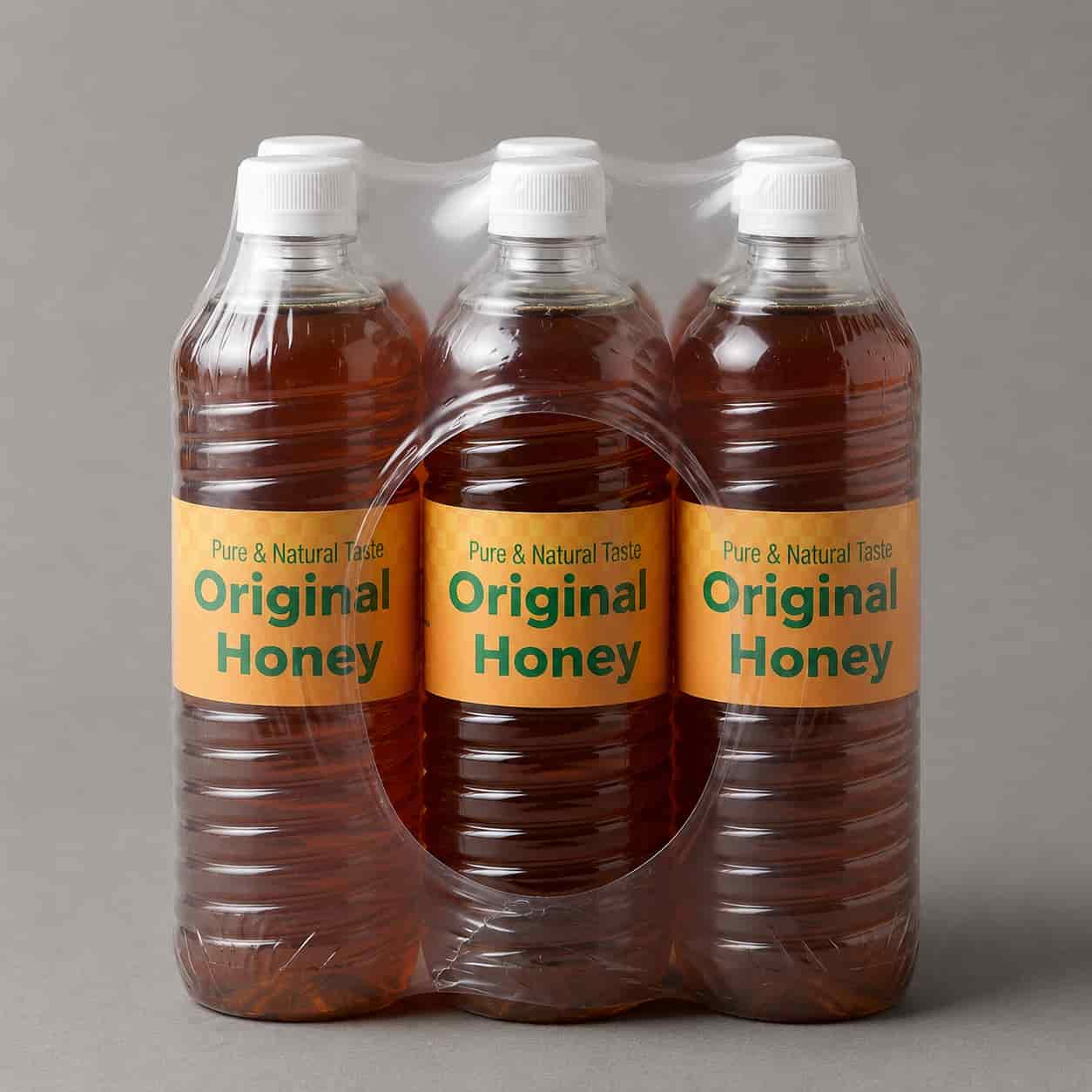 Original honey in a clear plastic bottle with a golden label