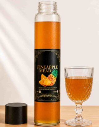 Bottle of Farm Fresh Grocery Pineapple Mead, a naturally fermented pineapple honey wine made in Lagos, Nigeria