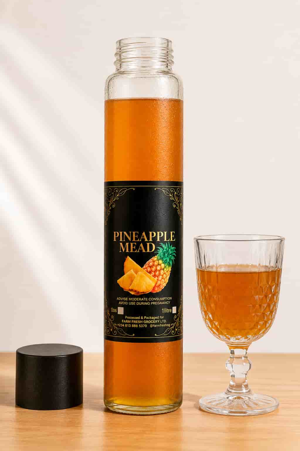 Bottle of Farm Fresh Grocery Pineapple Mead, a naturally fermented pineapple honey wine made in Lagos, Nigeria