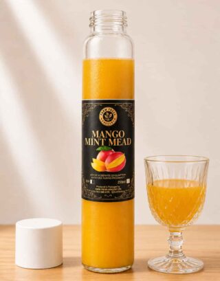 Bottle of Farm Fresh Grocery Mango Mint Mead, a naturally fermented mango and mint honey wine made in Lagos, Nigeria