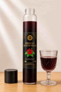 Bottle of Farm Fresh Grocery Hibiscus Bloom Mead, a naturally fermented hibiscus honey wine made in Lagos, Nigeria