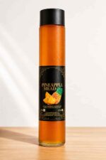 Bottle of Farm Fresh Grocery Pineapple Mead, a naturally fermented pineapple honey wine made in Lagos, Nigeria