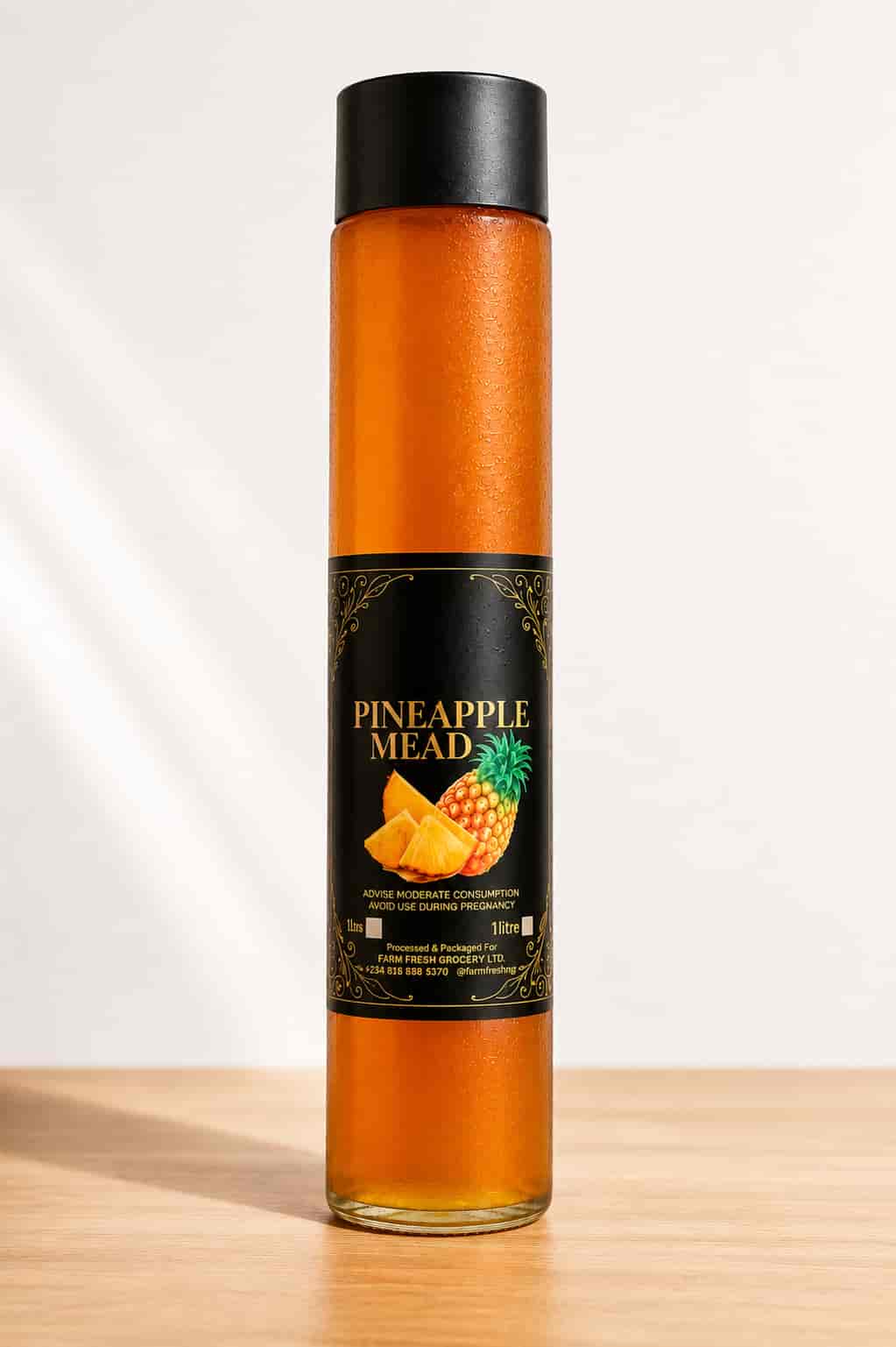 Bottle of Farm Fresh Grocery Pineapple Mead, a naturally fermented pineapple honey wine made in Lagos, Nigeria